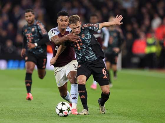 Football - 2024 2025 UEFA Champions League - League Phase - Matchday 2 8 - Aston Villa vs Bayern Munich - Villa Park - Wednesday 2nd October 2024 Ollie Watkins of Aston Villa tussles with Joshua Kimmich of Bayern Munich 