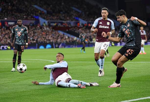 Football - 2024 2025 UEFA Champions League - League Phase - Matchday 2 8 - Aston Villa vs Bayern Munich - Villa Park - Wednesday 2nd October 2024 Ezri Konsa of Aston Villa handles the ball in the penalty area after a cross from Aleksandar Pavlovi? of Bayern Munich 