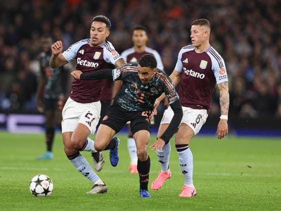 Football - 2024 2025 UEFA Champions League - League Phase - Matchday 2 8 - Aston Villa vs Bayern Munich - Villa Park - Wednesday 2nd October 2024 Morgan Rogers of Aston Villa, Jamal Musiala of Bayern Munich and Ross Barkley 