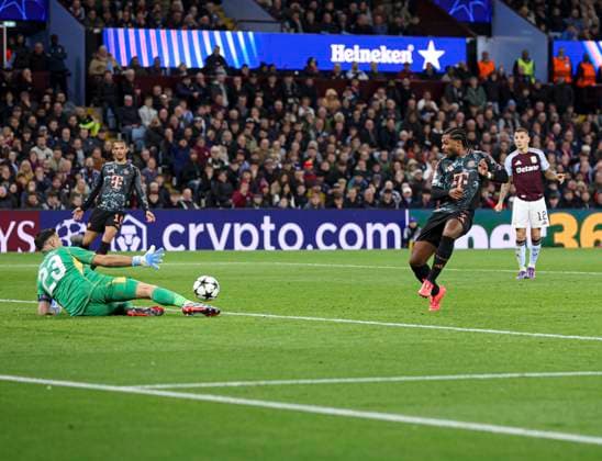 Football - 2024 2025 UEFA Champions League - League Phase - Matchday 2 8 - Aston Villa vs Bayern Munich - Villa Park - Wednesday 2nd October 2024 Emiliano Martinez of Aston Villa saves from Serge Gnabry of Bayern Munich 