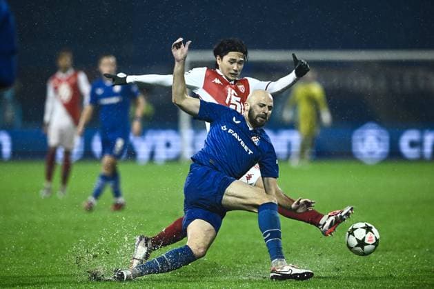 GNK Dinamo v AS Monaco - UEFA Champions League 2024 25 League Phase MD2 ZAGREB, CROATIA - OCTOBER 2: Josip Misic of Dinamo Zagreb in action against Takumi Minamino of Monaco during UEFA Champions League 2024 25 League Phase MD2 match between GNK Dinamo v AS Monaco at Maksimir Stadion on October 2, 2024 in Zagreb, Croatia.  MarkoxLukunic PIXSELL