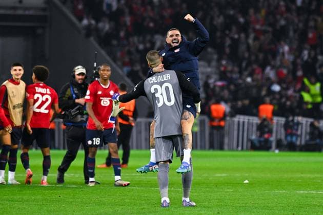 Lucas Chevalier ( 30 - Lille ) and Remy CABELLA ( 10 - Lille ) celebrate their side s victory after the UEFA Champions League match between Lille OSC and Real Madrid CF at Stade Pierre Mauroy on October 02, 2024 in Lille, France. ( Photo by federico pestellini panoramic ) - FOOTBALL : Lille vs Real Madrid - Ligue des Champions - 02 10 2024 FedericoPestellini Panoramic 