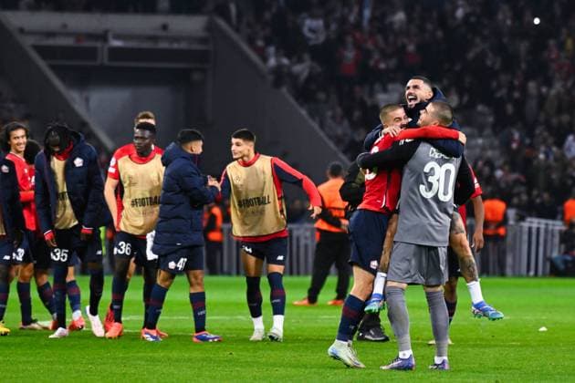 Edon ZHEGROVA ( 23 - Lille ) , Lucas Chevalier ( 30 - Lille ) and Remy CABELLA ( 10 - Lille ) celebrate their side s victory after the UEFA Champions League match between Lille OSC and Real Madrid CF at Stade Pierre Mauroy on October 02, 2024 in Lille, France. ( Photo by federico pestellini panoramic ) - FOOTBALL : Lille vs Real Madrid - Ligue des Champions - 02 10 2024 FedericoPestellini Panoramic 