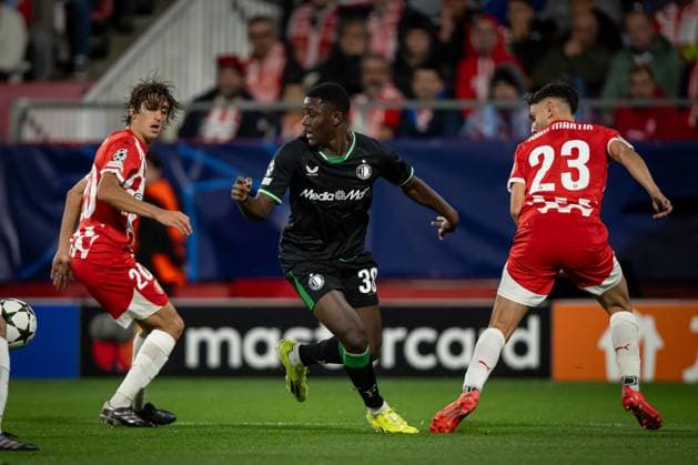 October 2, 2024, Girona, Milan, Italy: Jordan Lotomba (Feyenoord) and Ivan Martin (Girona FC) battle for the ball during a UEFA Champions League match between Girona FC and Feyenoord at Estadi Municipal de Montilivi in Girona, Girona, Spain, on October 02 2024. Felipe Mondino CALCIO - UEFA Champions League - Girona vs Feyenoord  - ZUMAs349 20241002_zsa_s349_156 Copyright: xFelipexMondino IpaxSportx xIpa-Ax
