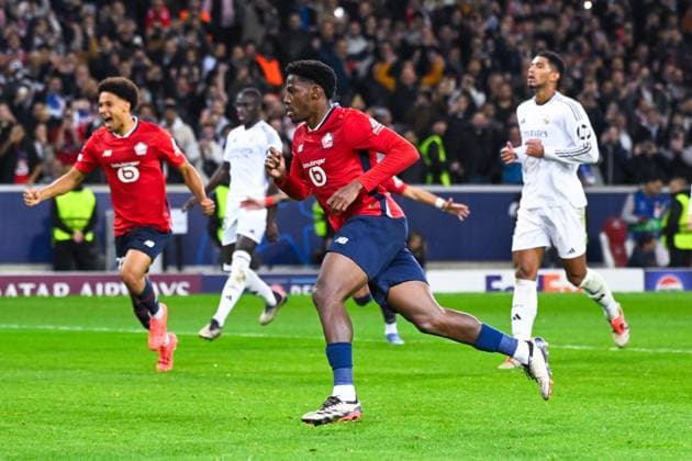 Jonathan David ( 9 - Lille ) celebrates after scoring during the UEFA Champions League match between Lille OSC and Real Madrid CF at Stade Pierre Mauroy on October 02, 2024 in Lille, France. ( Photo by federico pestellini panoramic ) - FOOTBALL : Lille vs Real Madrid - Ligue des Champions - 02 10 2024 FedericoPestellini Panoramic 