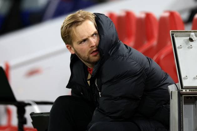 Liverpool, England, 2nd October 2024. Caoimhin Kelleher of Liverpool looks on from the bench prior to the UEFA Champions League match at Anfield, Liverpool. Picture credit should read: Jessica Hornby Sportimage EDITORIAL USE ONLY. No use with unauthorised audio, video, data, fixture lists, club league logos or live services. Online in-match use limited to 120 images, no video emulation. No use in betting, games or single club league player publications. SPI-3353-0050