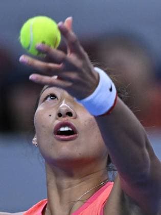 (241003) -- BEIJING, Oct. 3, 2024 -- Zheng Qinwen serves during the women s singles round of 16 match between Amanda Anisimova of the United States and Zheng Qinwen of China at the 2024 China Open tennis tournament in Beijing, China, Oct. 2, 2024. ) (SP)CHINA-BEIJING-TENNIS-CHINA OPEN-WOMEN S SINGLES(CN) ZhangxLong 