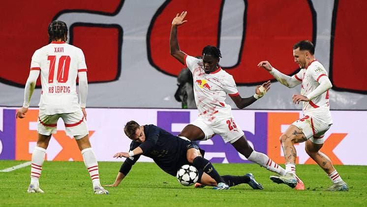 Soccer UEFA Champions League, season 2024 2025, group stage, match day 2, RB Leipzig vs Juventus Turin 02 10 2024 2 3 1 0 duel for the ball between Castello Lukeba center back RB Leipzig, back number 23, 23 2 f r and Francisco Conceicao right winger Juventus Turin, back number 7 2 f l during the match RB Leipzig vs Juventus Turin 02 10 2024 Leipzig Saxony Germany Red Bull Arena