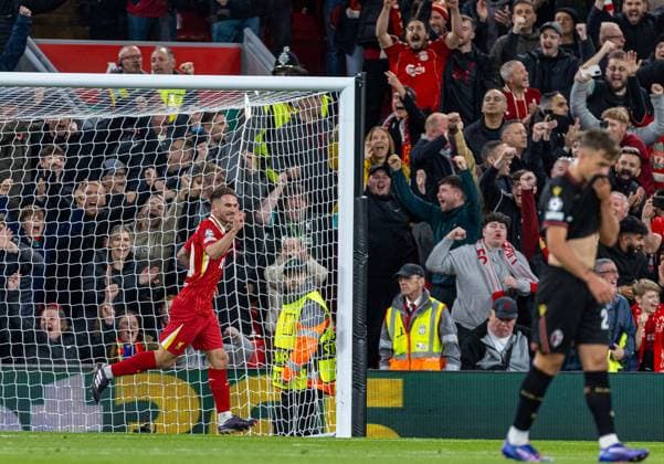 (241003) -- LIVERPOOL, Oct. 3, 2024 -- Liverpool s Alexis Mac Allister celebrates after scoring the opening goal during the second round match of UEFA Champions League between Liverpool FC and Bologna FC in Liverpool, Britain, Oct. 2, 2024. (SP)BRITAIN-LIVERPOOL-UEFA CHAMPIONS LEAGUE-LIVERPOOL VS BOLOGNA LixYing 