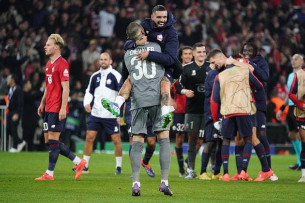 Lucas Chevalier and Remy Cabella of Lille celebrate their side s 1-0 win Lille v Real Madrid, UEFA Champions League, Group Stage, Football, Pierre Mauroy Stadium, Lille, France, 02 Oct 2024 EDITORIAL USE ONLY No use with unauthorised audio, video, data, fixture lists, club league logos or live services. Online in-match use limited to 120 images, no video emulation. No use in betting, games or single club league player publications. Copyright: xDavexWinter Shutterstockx 14750773mm