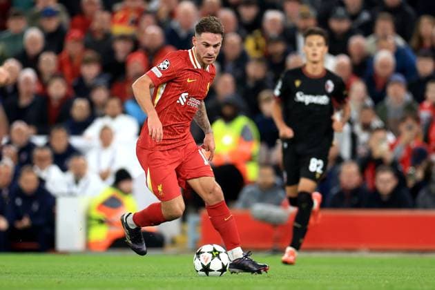 Liverpool, England, 2nd October 2024. Alexis Mac Allister of Liverpool runs with the ball during the UEFA Champions League match at Anfield, Liverpool. Picture credit should read: Jessica Hornby Sportimage EDITORIAL USE ONLY. No use with unauthorised audio, video, data, fixture lists, club league logos or live services. Online in-match use limited to 120 images, no video emulation. No use in betting, games or single club league player publications. SPI-3353-0107
