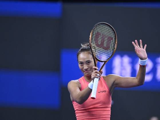 (241003) -- BEIJING, Oct. 3, 2024 -- Zheng Qinwen gestures during the women s singles round of 16 match between Amanda Anisimova of the United States and Zheng Qinwen of China at the 2024 China Open tennis tournament in Beijing, China, Oct. 2, 2024. ) (SP)CHINA-BEIJING-TENNIS-CHINA OPEN-WOMEN S SINGLES(CN) ZhangxLong 