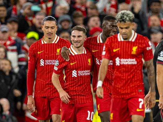 (241003) -- LIVERPOOL, Oct. 3, 2024 -- Liverpool s Alexis Mac Allister (2nd L) celebrates with teammates after scoring the opening goal during the second round match of UEFA Champions League between Liverpool FC and Bologna FC in Liverpool, Britain, Oct. 2, 2024. (SP)BRITAIN-LIVERPOOL-UEFA CHAMPIONS LEAGUE-LIVERPOOL VS BOLOGNA LixYing 