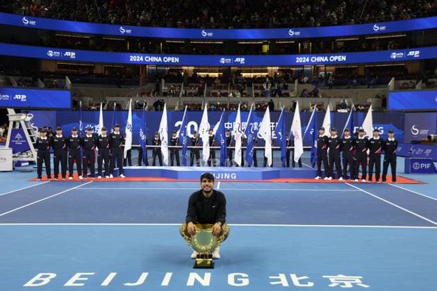 BEIJING, CHINA - OCTOBER 02: Carlos Alcaraz of Spain celebrates with champion trophy after winning the Men s Singles Final match against Jannik Sinner of Italy on day ten of 2024 China Open at National Tennis Center on October 2, 2024 in Beijing, China.  Copyright: xChinaxNewsxServicex 111521646458