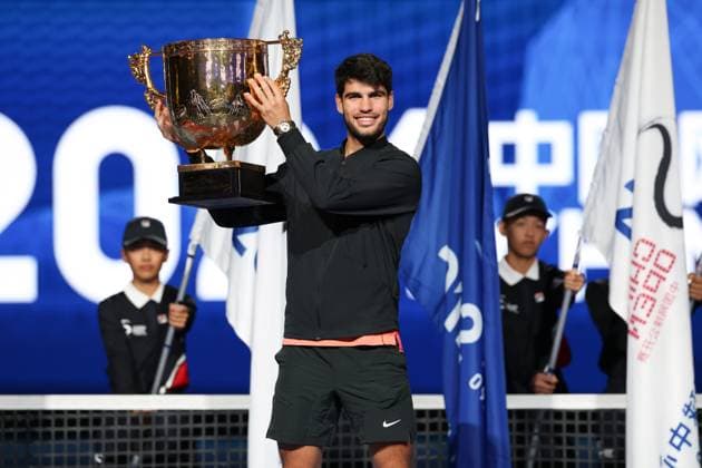 BEIJING, CHINA - OCTOBER 02: Carlos Alcaraz of Spain celebrates with champion trophy after winning the Men s Singles Final match against Jannik Sinner of Italy on day ten of 2024 China Open at National Tennis Center on October 2, 2024 in Beijing, China.  Copyright: xChinaxNewsxServicex 111521646457