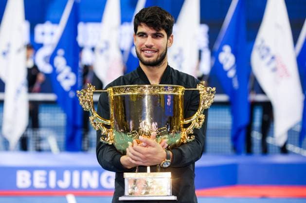 BEIJING, CHINA - OCTOBER 02: Carlos Alcaraz of Spain celebrates with champion trophy after winning the Men s Singles Final match against Jannik Sinner of Italy on day ten of 2024 China Open at National Tennis Center on October 2, 2024 in Beijing, China.  Copyright: xVCGx 111521674862