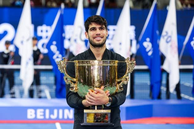BEIJING, CHINA - OCTOBER 02: Carlos Alcaraz of Spain celebrates with champion trophy after winning the Men s Singles Final match against Jannik Sinner of Italy on day ten of 2024 China Open at National Tennis Center on October 2, 2024 in Beijing, China.  Copyright: xVCGx 111521674859