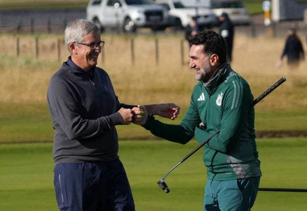 PGA, Golf Herren Tour Commissioner Jay Monahan bumps fists with LIV Golf & Newcastle United fc Chairman His Excellency Yasir Al Rumayyan on the 18th hole. Alfred Dunhill Links Championship 2024, Day One, Golf, The Belfry, Angus and Fife, Scotland, UK - 03 Oct 2024  Copyright: xStuartxWallace Shutterstockx 14751990k