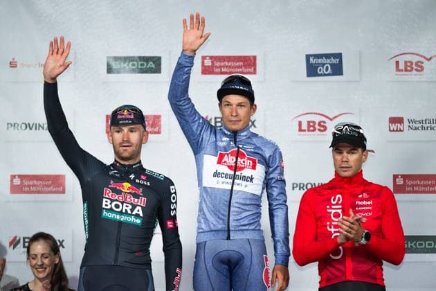 Münsterland Giro 2024, 03 10 2024 Podium vlnr 2 Jordi Meeus BEL, Red Bull BORA hansgrohe , 1 Jasper Philipsen BEL, Alpecin Deceuninck , 3 Milan Fretin BEL, Cofidis , Sparkassen Münsterland Giro, Münster GER , 03 10 2024 Copyright: xBEAUTIFULxSPORTS Hilgerx