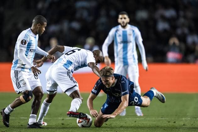 241003 Erik Botheim of Malmö FF and Julio Romao of Qarabag during the UEFA Europa League football match between Qarabag and Malmö FF on October 3, 2024 in Baku Photo Petter Arvidson BILDBYRAN kod PA PA0893 fotboll football soccer fotball uefa europa league qarabag malmö ff bbeng bbauto  Copyright: PETTERxARVIDSON BB241003PA062