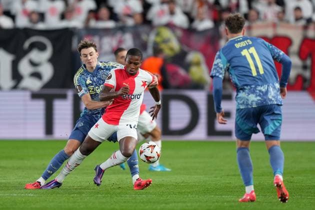 PRAGUE, 03-10-2024 , Eden Arena, football, UEFA Europa League, season 2024 2025, Match between Slavia Praag and Ajax , (L-R) Ajax player Youri Baas, Slavia Praag player Simion Michez Slavia Praag - Ajax  x26382264x Copyright: