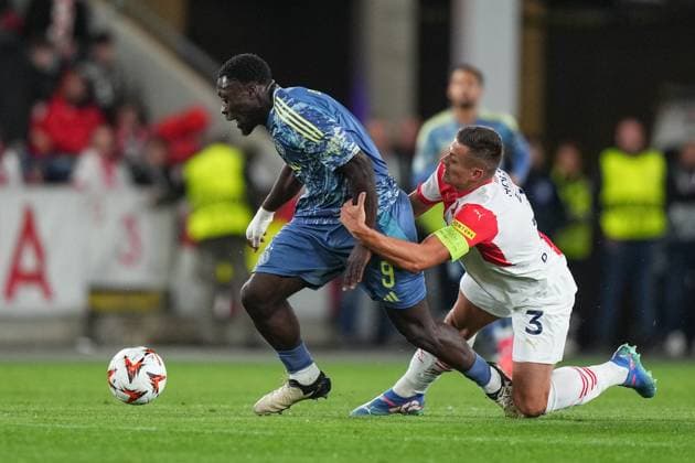 PRAGUE, 03-10-2024 , Eden Arena, football, UEFA Europa League, season 2024 2025, Match between Slavia Praag and Ajax , (L-R) Ajax player Brian Brobbey, Slavia Praag player Tomas Holes Slavia Praag - Ajax  x26382265x Copyright: