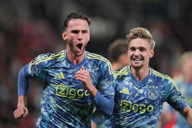 PRAGUE, 03-10-2024 , Eden Arena, football, UEFA Europa League, season 2024 2025, Match between Slavia Praag and Ajax , (L-R) Ajax player Branco van den Boomen celebrating his goal 0-1 , Ajax player Kenneth Taylor Slavia Praag - Ajax  x26382348x Copyright: