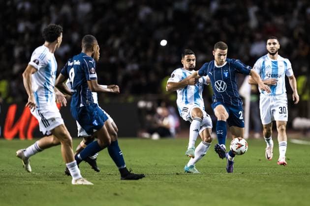 241003 Leandro Andrade of Qarabag and Gabriel Busanello of Malmö FF during the UEFA Europa League football match between Qarabag and Malmö FF on October 3, 2024 in Baku Photo Petter Arvidson BILDBYRAN kod PA PA0893 fotboll football soccer fotball uefa europa league qarabag malmö ff bbeng  Copyright: PETTERxARVIDSON BB241003PA074