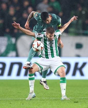 Cristian Romero of Tottenham Hotspur competes for the ball with Barnabas Varga of Ferencvaros Ferencvaros v Tottenham Hotspur, UEFA Europa League, Group Stage, Football, Groupama Arena, Budapest, Hungary, 03 Oct 2024 EDITORIAL USE ONLY No use with unauthorised audio, video, data, fixture lists, club league logos or live services. Online in-match use limited to 120 images, no video emulation. No use in betting, games or single club league player publications.  Copyright: xMichaelxZemanek Shutterstockx 14750796s