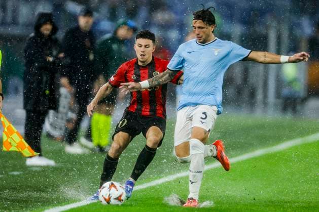 UEFA Europa League League phase - Matchday 2 match between SS Lazio vs OGC Nice OGC Nice s French defender Tom Louchet challenges for the ball with Lazio s Italian defender Luca Pellegrini during UEFA Europa League League phase - Matchday 2 match between SS Lazio vs OGC Nice at Olimpico stadium on October 03, 2024 in Rome, Italy. ABPH5931_1 Copyright: xAntonioxBalascox