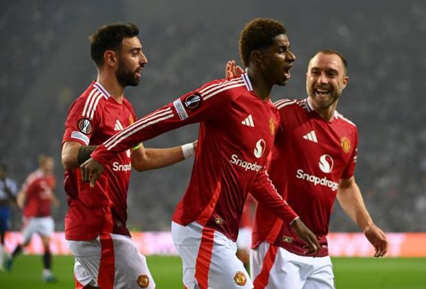 Marcus Rashford of Manchester United, ManU celebrates scoring to make it 0-1 Porto v Manchester United, UEFA Europa League, Group Stage, Football, Estadio do Dragao, Porto, Portugal, 03 Oct 2024 EDITORIAL USE ONLY No use with unauthorised audio, video, data, fixture lists, club league logos or live services. Online in-match use limited to 120 images, no video emulation. No use in betting, games or single club league player publications. Copyright: xZedxJameson Shutterstockx 14750815bt