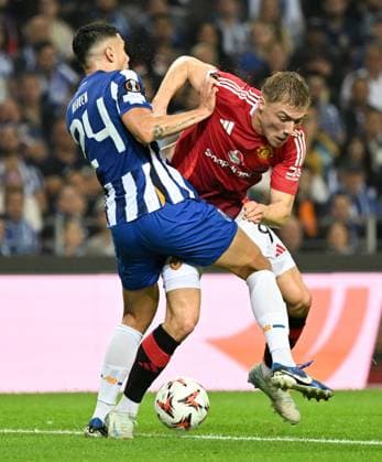 Nehuà n Pà rez of Porto FC and Rasmus Hojlund of Manchester United, ManU Porto v Manchester United, UEFA Europa League, Group Stage, Football, Estadio do Dragao, Porto, Portugal, 03 Oct 2024 EDITORIAL USE ONLY No use with unauthorised audio, video, data, fixture lists, club league logos or live services. Online in-match use limited to 120 images, no video emulation. No use in betting, games or single club league player publications. Copyright: xZedxJameson Shutterstockx 14750815db