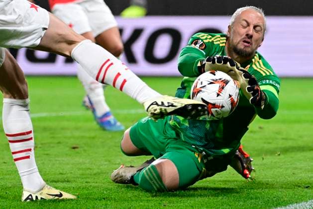 L-R Lukas Provod (Slavia, only legs are seen) and goalkeeper Remko Pasveer (Ajax) in action during the Football Europa League 2nd round match SK Slavia Prague vs Ajax Amsterdam in Prague, Czech Republic, October 3, 2024. (CTKxPhoto OndrejxDeml) CTKPhotoP2024100307542  CTKPhotoP2024100307542