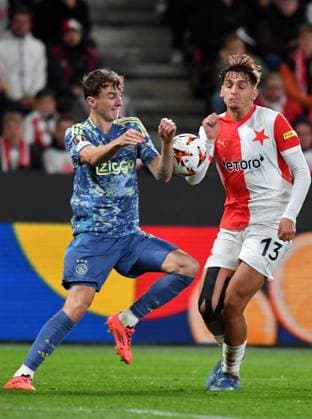 October 3, 2024, Prague, Czech Republic: Slavias MOJMIR CHYTIL (13) duels for the ball with Ajax s YOURI BAAS (L) at Eden Stadion during Round 2, of the UEFA Europa League, at October 3, 2024, in Prague in the Czech Republic. Prague Czech Republic - ZUMAr156 20241003_aap_r156_013 Copyright: xSlavekxRutax