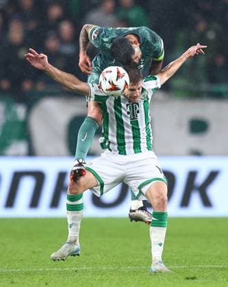 Cristian Romero of Tottenham Hotspur competes for the ball with Barnabas Varga of Ferencvaros Ferencvaros v Tottenham Hotspur, UEFA Europa League, Group Stage, Football, Groupama Arena, Budapest, Hungary, 03 Oct 2024 EDITORIAL USE ONLY No use with unauthorised audio, video, data, fixture lists, club league logos or live services. Online in-match use limited to 120 images, no video emulation. No use in betting, games or single club league player publications.  Copyright: xMichaelxZemanek Shutterstockx 14750796bk