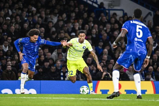 Chelsea s Renato Veiga and Gent s Noah Fadiga pictured in action during a soccer match between British team Chelsea FC and Belgian team KAA Gent, Thursday 03 October 2024 in London, for the opening day of the UEFA Conference League tournament. TOM GOYVAERTS TomxGoyvaerts  x101882328x
