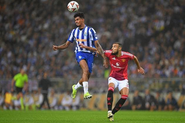 3rd October 2024: Dragao Stadium, Porto, Portugal; Europa League football, FC Porto versus Manchester United, ManU Wenderson Galeno of Porto wins the header above Noussair Mazraoui of Manchester United  ActionPlus12699620 DanielxCastro