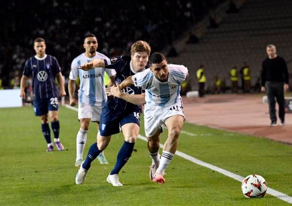 (241004) -- BAKU, Oct. 4, 2024 -- Abbas Huseynov (1st R) of Qarabag vies with Oliver Berg (2nd R) of Malmo during a UEFA Europa League match between Qarabag and Malmo in Baku, Azerbaijan, Oct. 3, 2024. (Photo by Tofik Babayev Xinhua) (SP)AZERBAIJAN-BAKU-FOOTBALL-UEFA EUROPA LEAGUE-QARABAG VS MALMO ZhongxZhong 