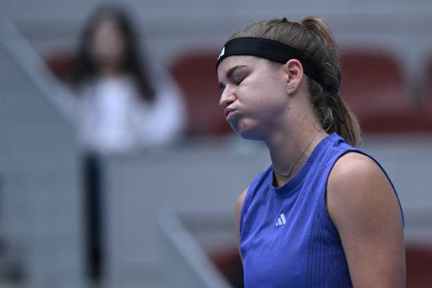 (241004) -- BEIJING, Oct. 4, 2024 -- Karolina Muchova reacts during the women s singles quarterfinal match between Karolina Muchova of the Czech Republic and Aryna Sabalenka of Belarus at the 2024 China Open tennis tournament in Beijing, China, Oct. 4, 2024 ) (SP)CHINA-BEIJING-TENNIS-CHINA OPEN-WOMEN S SINGLES(CN) ZhangxLong 