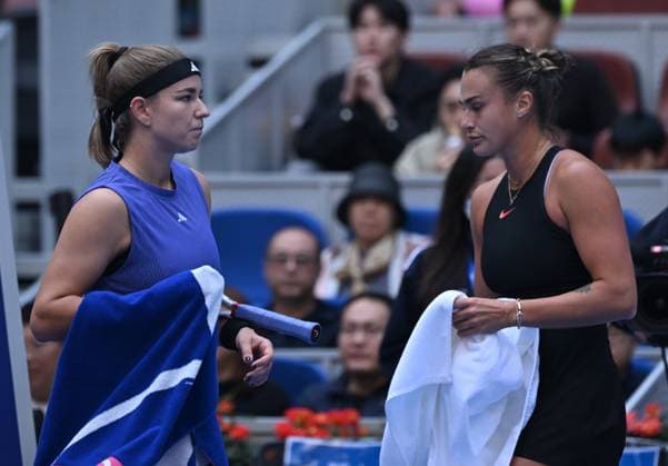 (241004) -- BEIJING, Oct. 4, 2024 -- Karolina Muchova (L) and Aryna Sabalenka react during the women s singles quarterfinal match between Karolina Muchova of the Czech Republic and Aryna Sabalenka of Belarus at the 2024 China Open tennis tournament in Beijing, China, Oct. 4, 2024 ) (SP)CHINA-BEIJING-TENNIS-CHINA OPEN-WOMEN S SINGLES(CN) ZhangxLong 