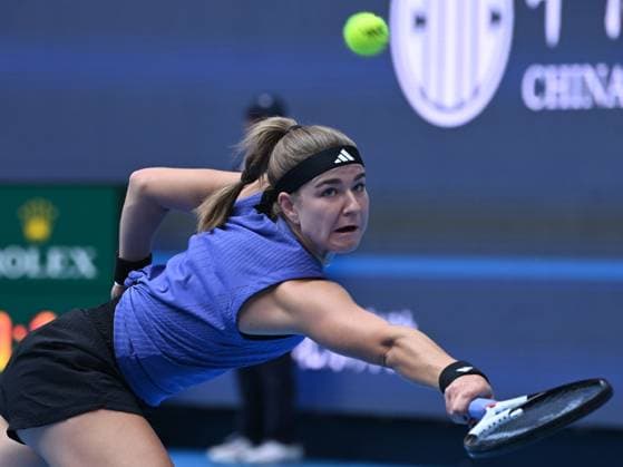 (241004) -- BEIJING, Oct. 4, 2024 -- Karolina Muchova hits a return during the women s singles quarterfinal match between Karolina Muchova of the Czech Republic and Aryna Sabalenka of Belarus at the 2024 China Open tennis tournament in Beijing, China, Oct. 4, 2024 ) (SP)CHINA-BEIJING-TENNIS-CHINA OPEN-WOMEN S SINGLES(CN) ZhangxLong 