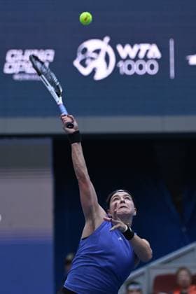 (241004) -- BEIJING, Oct. 4, 2024 -- Karolina Muchova serves during the women s singles quarterfinal match between Karolina Muchova of the Czech Republic and Aryna Sabalenka of Belarus at the 2024 China Open tennis tournament in Beijing, China, Oct. 4, 2024 ) (SP)CHINA-BEIJING-TENNIS-CHINA OPEN-WOMEN S SINGLES(CN) ZhangxLong 