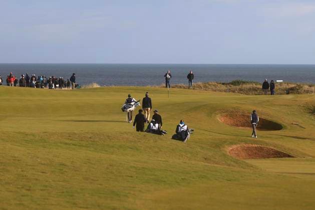 4th October 2024; Kingsbarns, Fife, Scotland; Alfred Dunhill Links Golf Championship, Round 2; Golfers walk onto the first green on Kingsbarns Golf Links, during the second round of the Dunhill Links Championship  ActionPlus12699721 DavidxYoung