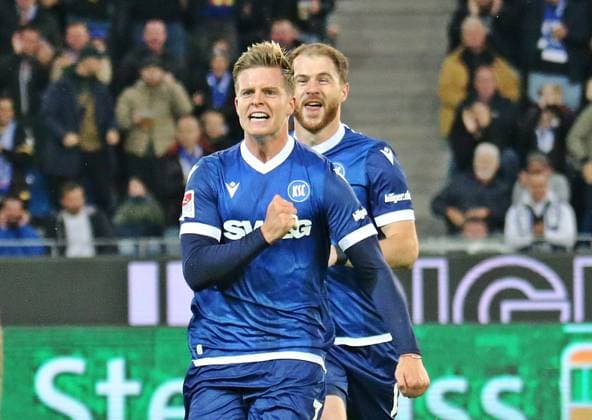 04 10 2024, xmohx, Soccer 2 Bundesliga, Karlsruher SC SV Darmstadt 98 emspor, v l Budu Zivzivadze and Dzenis Burnic karslruhe celebrate the 1 0 DFL DFB REGULATIONS PROHIBIT ANY USE OF PHOTOGRAPHS as IMAGE SEQUENCES and or QUASI VIDEO Karlsruhe