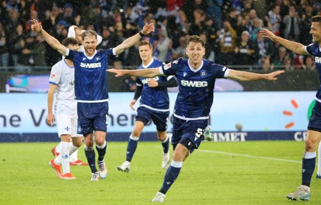04 10 2024, xmohx, Soccer 2 Bundesliga, Karlsruher SC SV Darmstadt 98 emspor, v l Budu Zivzivadze and Dzenis Burnic karslruhe celebrate the 1 0 DFL DFB REGULATIONS PROHIBIT ANY USE OF PHOTOGRAPHS as IMAGE SEQUENCES and or QUASI VIDEO Karlsruhe