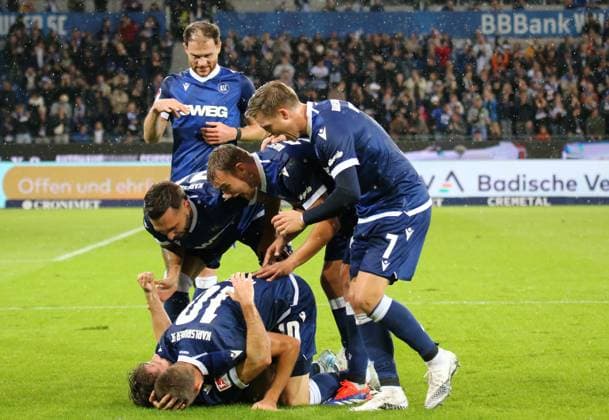 04 10 2024, xmohx, Soccer 2 Bundesliga, Karlsruher SC SV Darmstadt 98 emspor, v l Karslruhe cheered by Leon jensen the 2 1 DFL DFB REGULATIONS PROHIBIT ANY USE OF PHOTOGRAPHS as IMAGE SEQUENCES and or QUASI VIDEO Karlsruhe