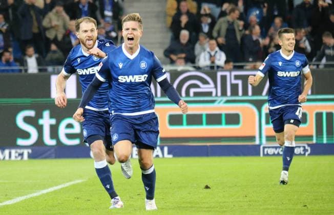 04 10 2024, xmohx, Soccer 2 Bundesliga, Karlsruher SC SV Darmstadt 98 emspor, v l Budu Zivzivadze and Dzenis Burnic karslruhe celebrate the 1 0 DFL DFB REGULATIONS PROHIBIT ANY USE OF PHOTOGRAPHS as IMAGE SEQUENCES and or QUASI VIDEO Karlsruhe