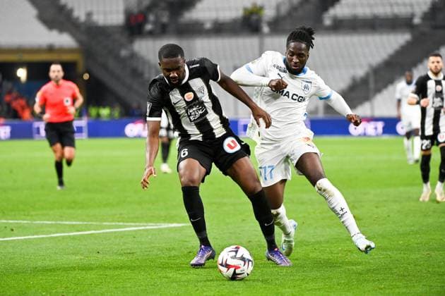 Olympique de Marseille v Angers SCO - Ligue 1 McDonald s 2024 2025 06 Jean-Eudes AHOLOU (sco) - 17 Jonathan ROWE (om) during the Ligue 1 McDonald s match between Marseille and Angers at Orange Velodrome on October 4, 2024 in Marseille, France. Marseille France  Copyright: xFEPx 776218675