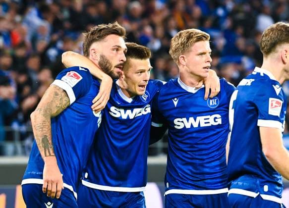 Fabian Schleusener Karlsruher SC , Marvin Wanitzek Karlsruher SC and Dzenis Burnic Karlsruher SC ä celebrate scoring their first goal, 2 Bundesliga, Karlsruher SC vs SV Darmstadt 98, BBBank Wildpark on October 04, 2024 in Karlsruhe, Germany Photo by Silas Schueller DeFodi Images Fabian Schleusener Karlsruher SC , Marvin Wanitzek Karlsruher SC and Dzenis Burnic Karlsruher SC ä celebrate scoring their first goal, 2 Bundesliga, Karlsruher SC vs SV Darmstadt 98, BBBank Wildpark on October 4, 2024 in Karlsruhe, Germany Photo by Silas Schueller DeFodi Images Defodi 738 738 KSCSVD 20241004 264 Defodi-738