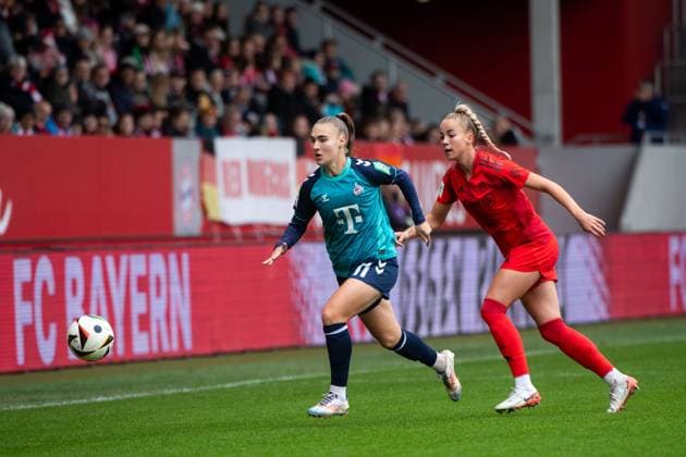 Alena Bienz FC Koeln, 11 in duel with Giulia Gwinn FC Bayern Muenchen, 07 , GER, FC Bayern Muenchen vs 1 FC Koeln, Fußball Google Pixel Frauen Bundesliga, 5 Spieltag, Saison 2024 2025, 05 10 2024 DFB regulations prohibit any use of photographs as image sequences and or quasi video GER, FC Bayern Muenchen vs 1 FC Koeln, Fussball Google Pixel Frauen Bundesliga, 5 Spieltag, Saison 2024 2025, 05 10 2024 Muenchen Copyright: xEibner-Pressefoto Memmlerx EP_MMR